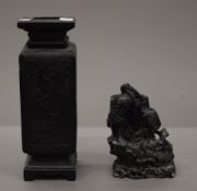 A 19th century Japanese carved basalt vase and a basalt spill vase. The former 28 cm high.