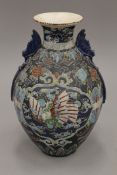 A late 19th/early 20th century Japanese Satsuma vase. 31 cm high.