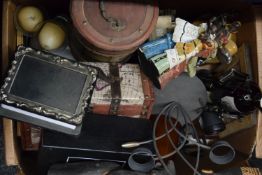 A box of miscellaneous items, including boxed cut glass, an African mask, boxes, etc.