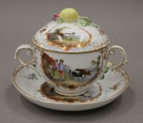 A 19th century Continental porcelain cup, cover and saucer. 12 cm high.