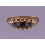 An antique 18 ct gold diamond and sapphire ring, hallmarked Chester. Ring size N. 2.