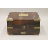 A 19th century brass mounted rosewood travelling box. 26 cm wide.