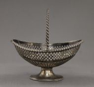 A silver swing handled basket. 19 cm long. 269 grammes.