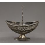 A silver swing handled basket. 19 cm long. 269 grammes.