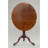 A 19th century mahogany tilt top tripod table. 69 cm wide, 67 cm high.