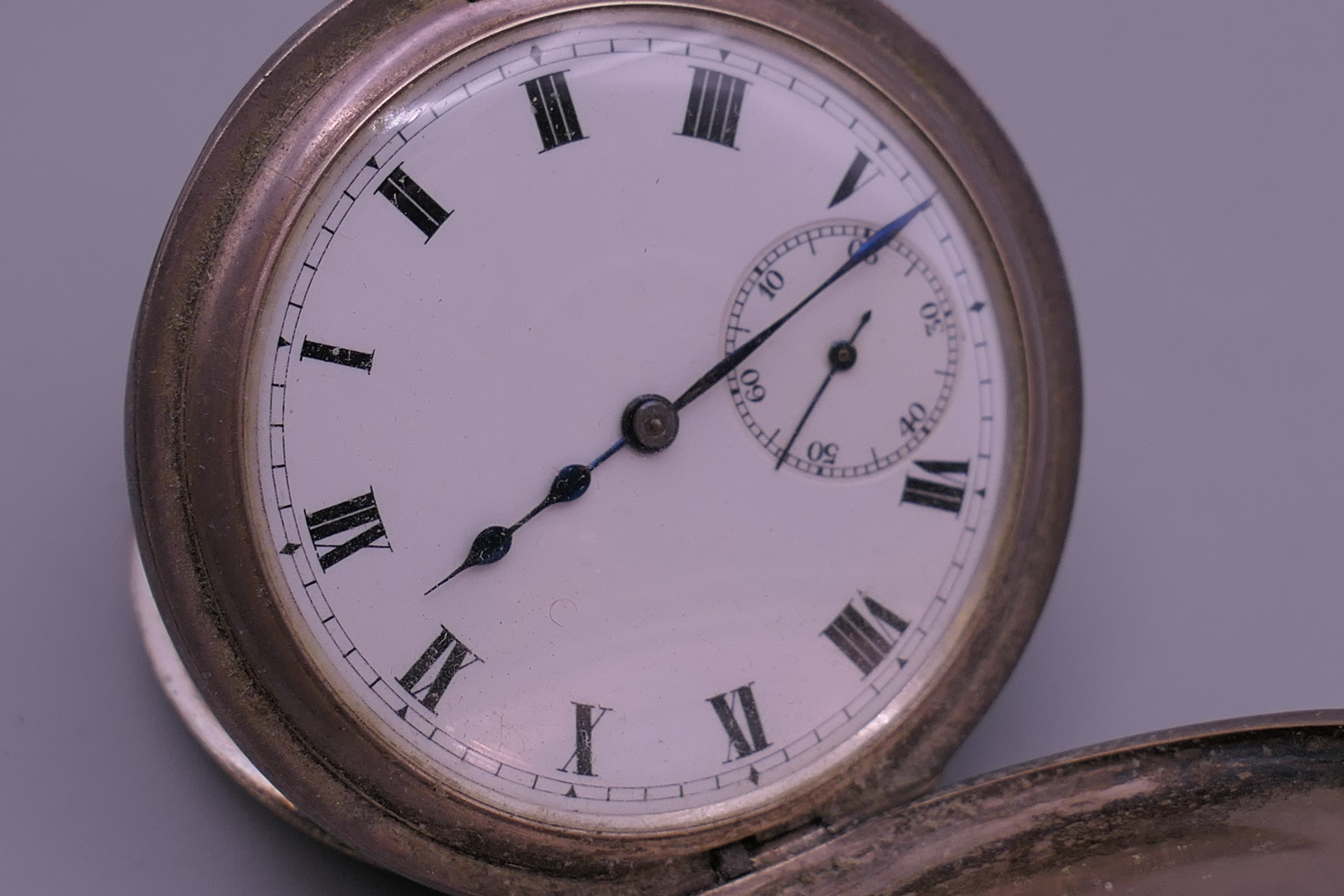 A silver pocket watch, a silver fob watch and a plated pocket watch. - Image 12 of 16