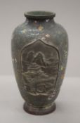 A 19th century Japanese cloisonne vase. 24 cm high.