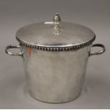 A Harrod's of London silver plated ice bucket. 17 cm high.