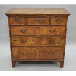 An 18th century walnut chest of drawers. 103 cm wide, 103.5 cm high, 53.5 cm deep.