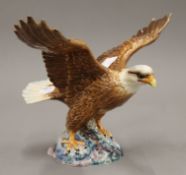 A Beswick porcelain eagle. 31.5 cm wide.