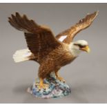 A Beswick porcelain eagle. 31.5 cm wide.