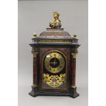 A Boulle bracket clock. 67 cm high.