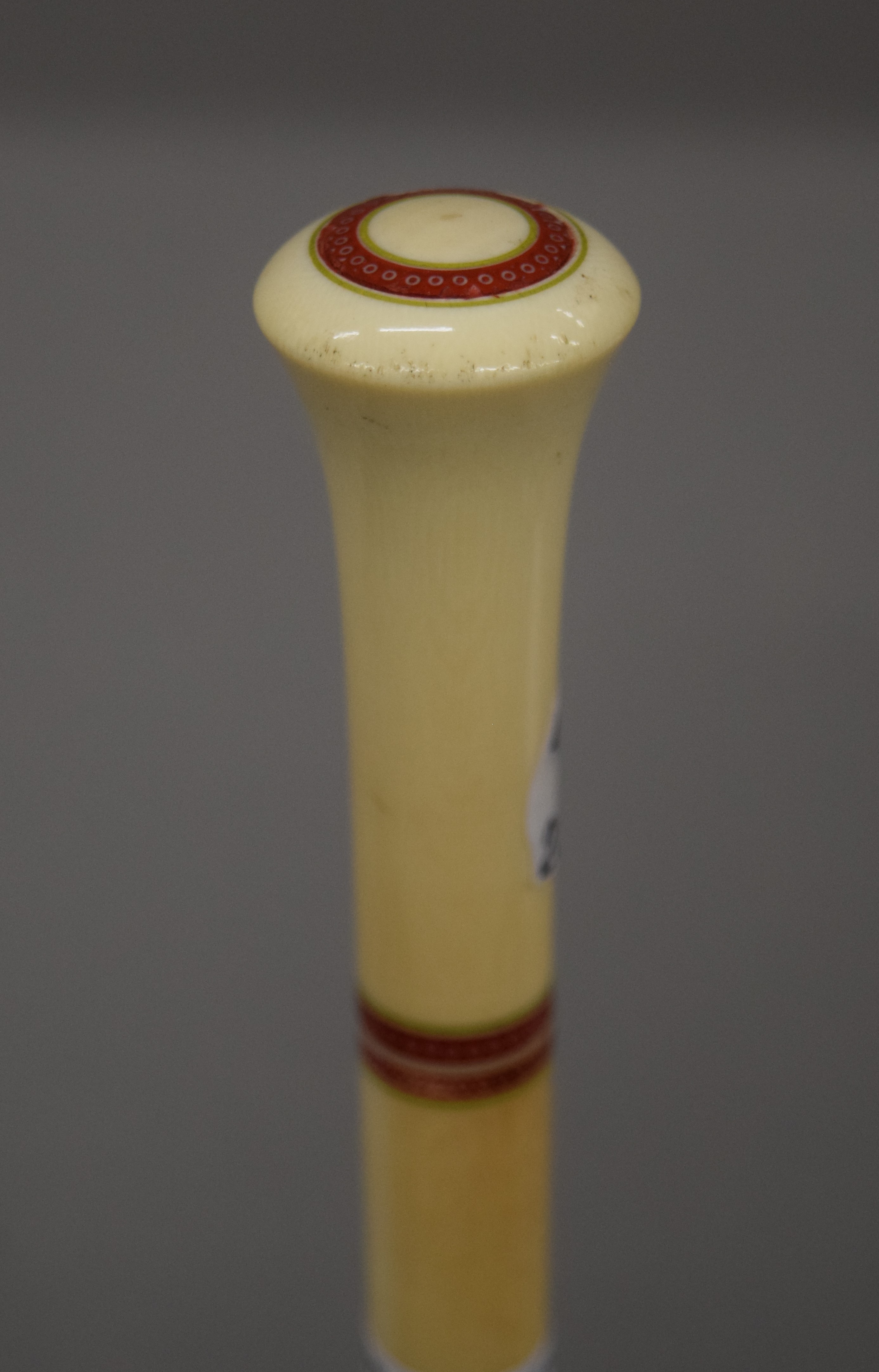 A late 19th/early 20th century segmented ivory walking stick in painted wooden container. - Image 3 of 3