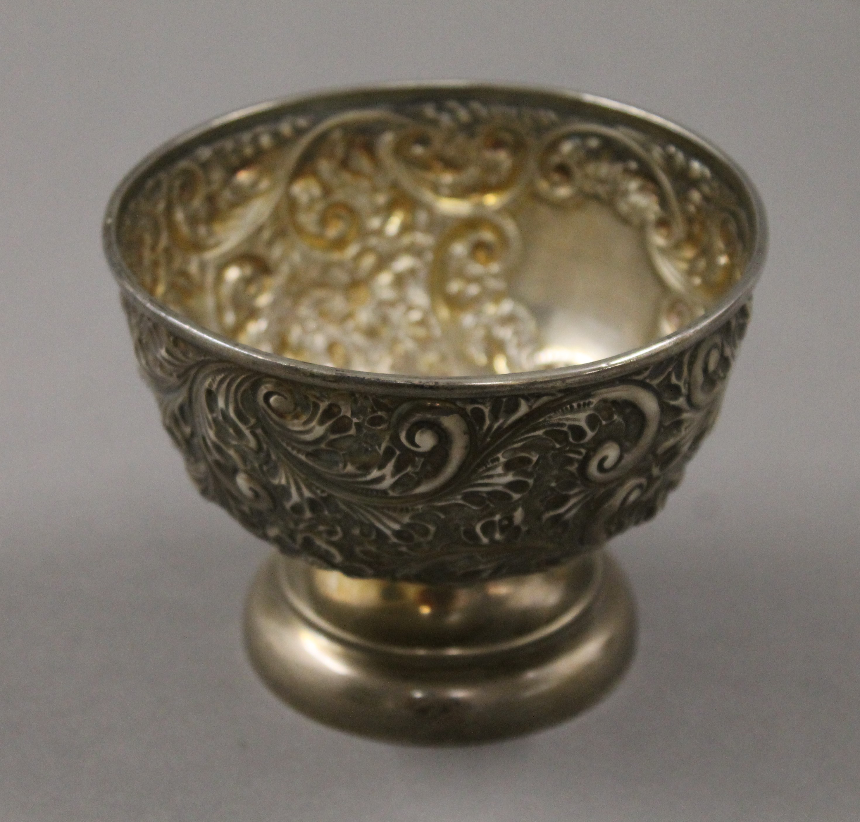 A silver embossed bowl. 8 cm high. - Image 2 of 5