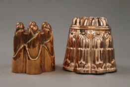 Two antique copper jelly moulds.