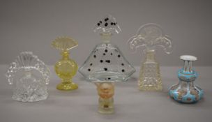 A collection of various scent/perfume bottles. The largest 19.5 cm high.