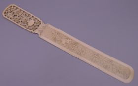 A 19th century Canton carved ivory letter opener. 32 cm long. 46.5g.
