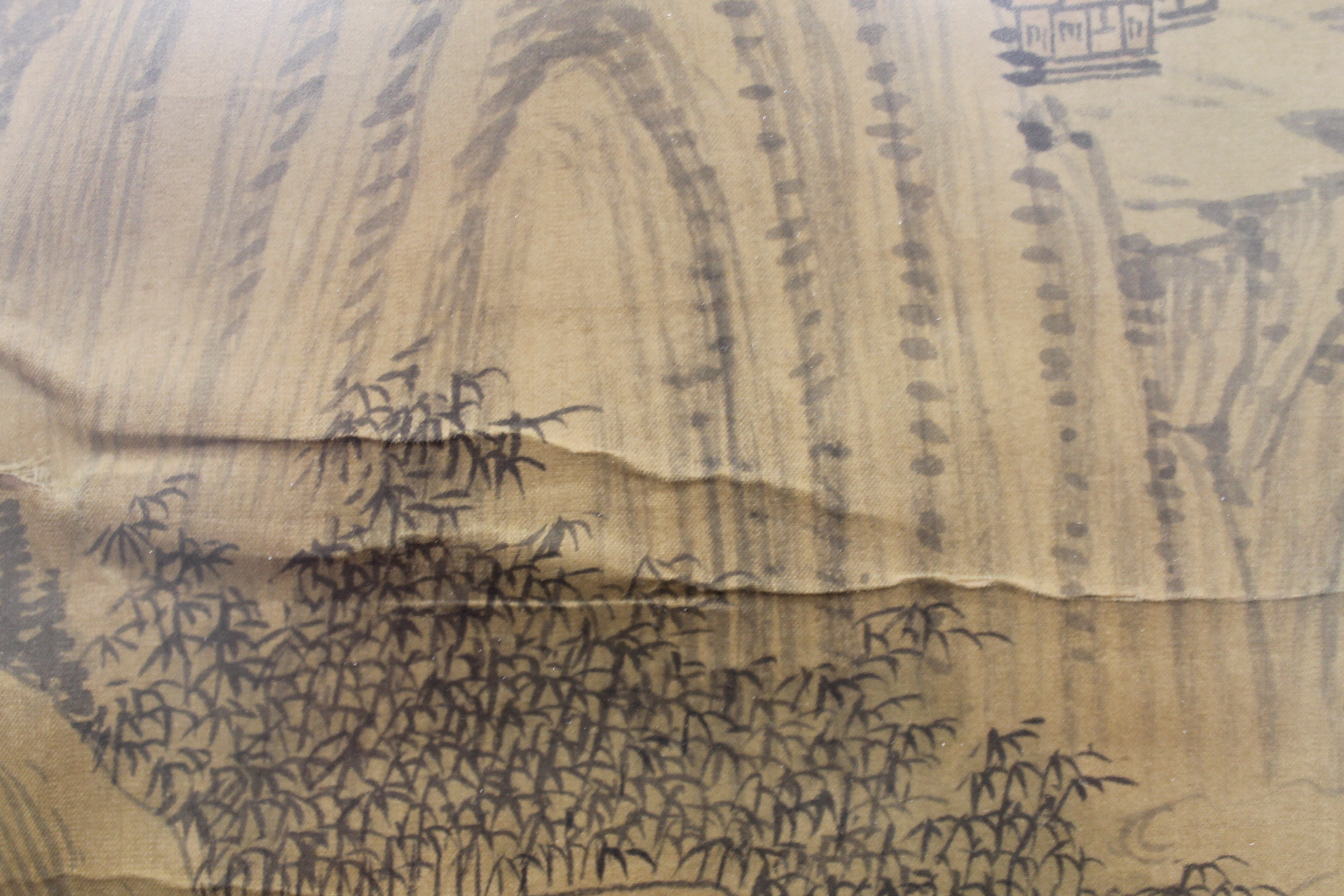 A 19th century Chinese silk scroll depicting Figures in a Mountainous Landscape, framed and glazed. - Image 8 of 9
