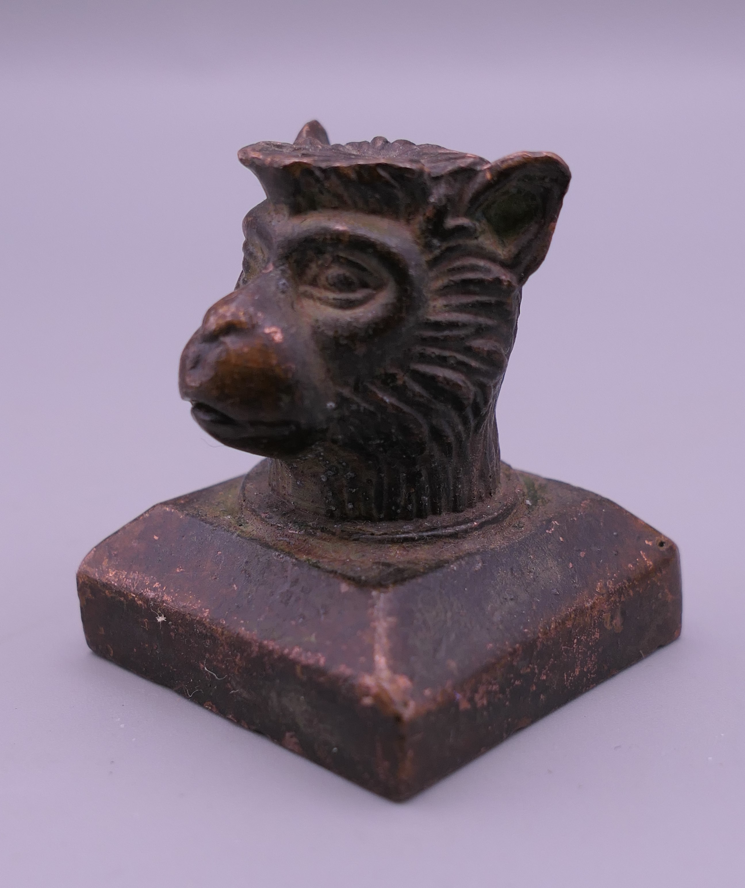 A Chinese bronze monkey seal. 4 cm high.