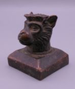 A Chinese bronze monkey seal. 4 cm high.
