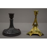 Two Art Nouveau candlesticks, one with a pen holder. The latter 14.5 cm high.