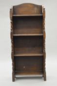 An early 20th century oak barley twist bookcase. 41 cm wide.