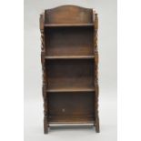 An early 20th century oak barley twist bookcase. 41 cm wide.