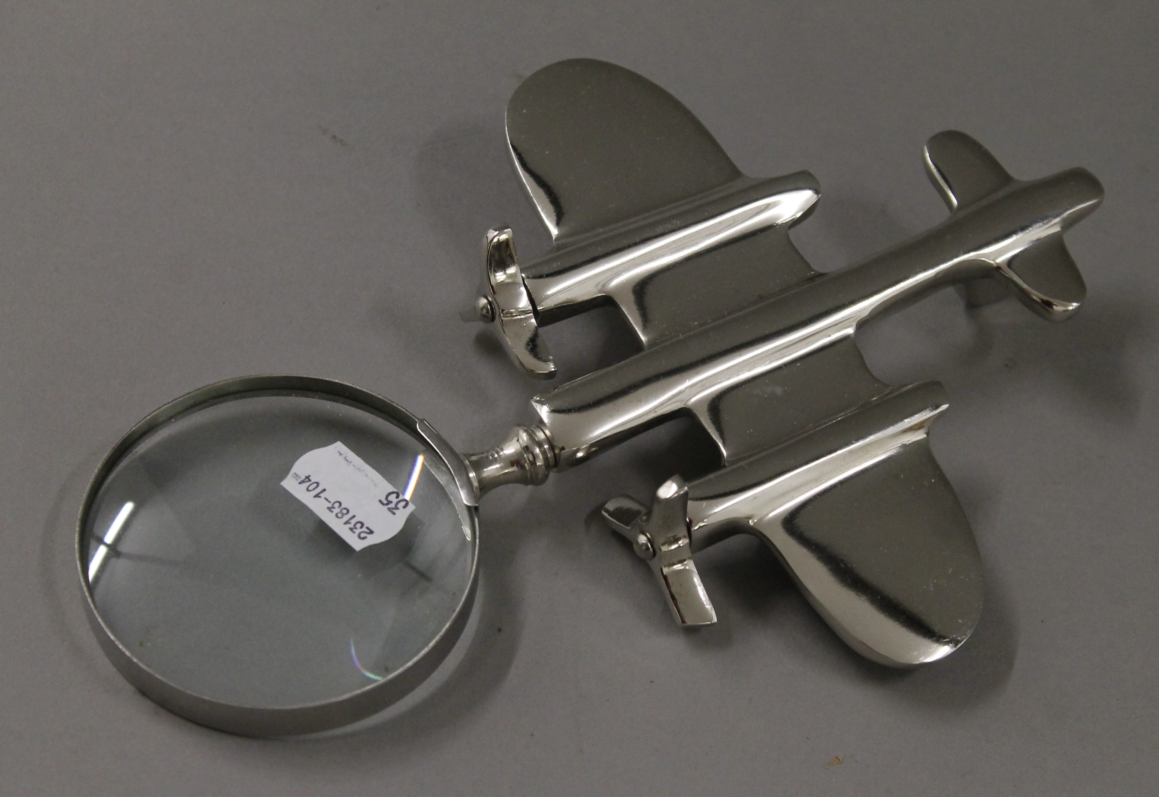 An aeroplane form magnifying glass. 23.5 cm long. - Image 2 of 2