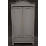 A white painted Continental pine knock down wardrobe. 108.5 cm wide, 187 cm high, 54.