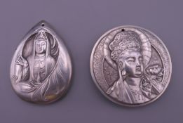 Two Chinese white metal pendants. The largest 4.75 cm diameter.