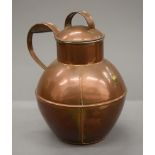 A copper Guernsey cream jug. 26 cm high.