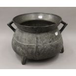 An antique bronze cauldron. 23 cm high.