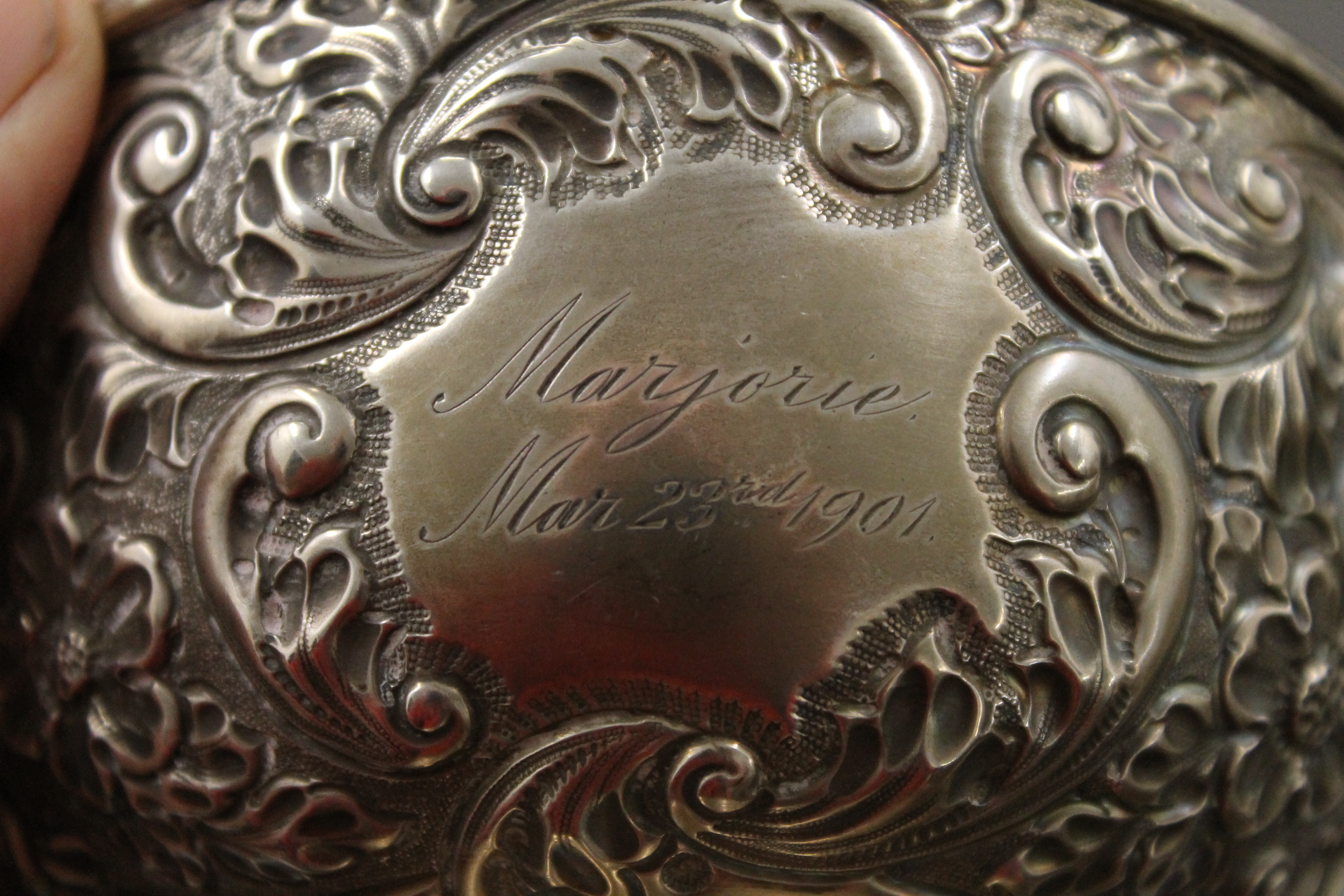 A silver embossed bowl. 8 cm high. - Image 5 of 5