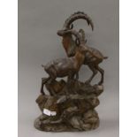 A Blackforest carved wooden model of two ibex on a rocky ledge. 46 cm high.