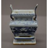 A Chinese blue and white porcelain censer. 13 cm high.