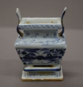 A Chinese blue and white porcelain censer. 13 cm high.