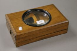 A Victorian walnut cased postcard viewer. 27.5 cm long when closed.