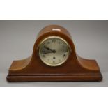 A Napoleon hat mantle clock.