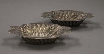 A pair of small silver bon-bon dishes. 12 cm long. 59.8 grammes.