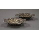 A pair of small silver bon-bon dishes. 12 cm long. 59.8 grammes.