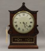 A Regency brass inlaid mahogany bracket clock. 46 cm high.