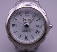 A Seiko Kinetic wristwatch.