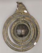 A bronze astrolabe. 42 cm high.