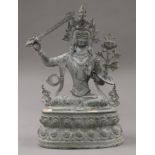 A patinated bronze model of buddha. 38 cm high.
