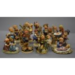 A collection of Hummel figures.