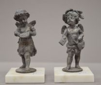 A pair of spelter figures. 18 cm high.