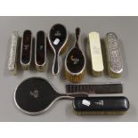 A silver and tortoiseshell dressing table set,