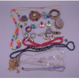 A bag of costume jewellery.