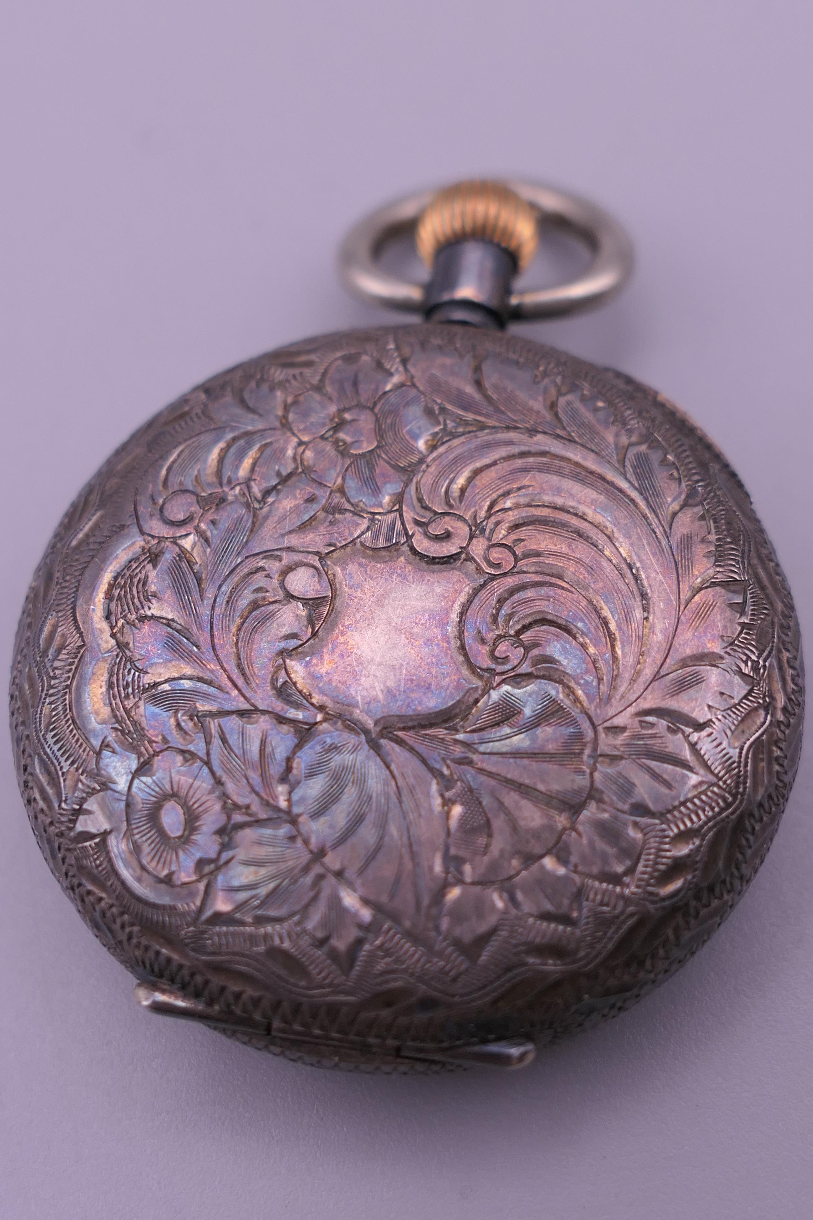 A silver pocket watch, a silver fob watch and a plated pocket watch. - Image 6 of 16