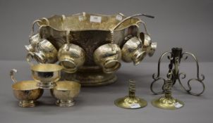 A silver plated punch bowl, ladle and cups; together with three silver plated bud vase bases.